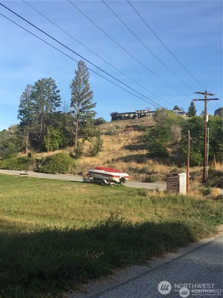 This .69 acre sits above the boat in the picture, on the north side of Riverview Cemetery Rd., across the road from 744 Riverview Rd.