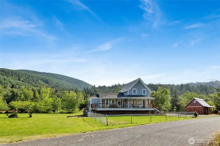 Shy 2-acres with a garage/shop and loads of privacy