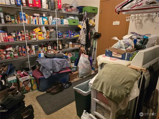 HUGE pantry & utility room can be made into whatever you need! Door opens into the 2-car garage.