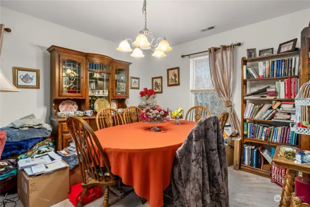 Dining room is large enough for an entertainment-sized table.