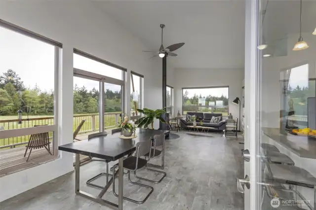 Light and bright with seamless access to the covered upper deck creates the perfect setting for entertaining.