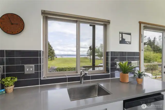 Enjoy water views from the kitchen sink—a serene backdrop for daily life.