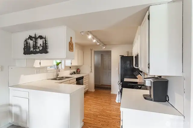 Functionally laid out kitchen with pass through counter.