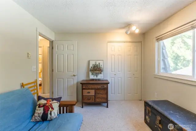 Third bedroom also looks out to back of property.