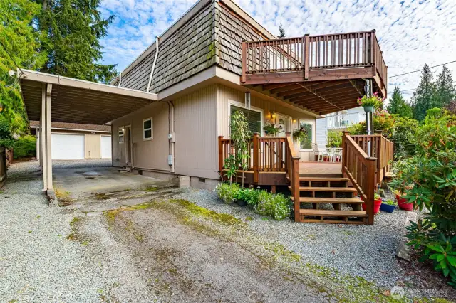 Covered parking next to the house or drive through to the shop.