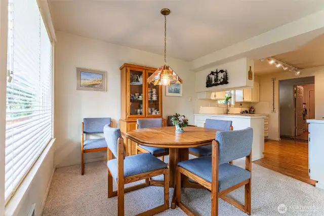 Light and bright dining area just off the kitchen and living room.