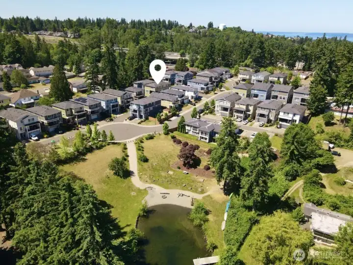 The private waterfront of Star Lake offers endless opportunities. Meet with neighbors, fish on the stocked lake, or go for a swim on a hot day.