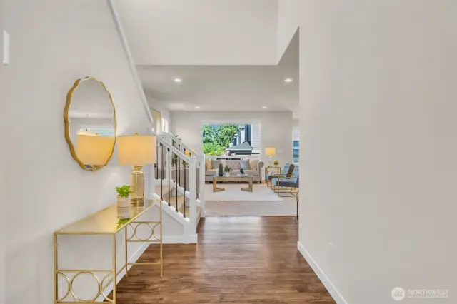 Grand entrance opens in to the large living room, kitchen and dining room.