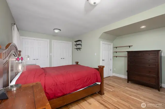 Primary bedroom features multiple closets