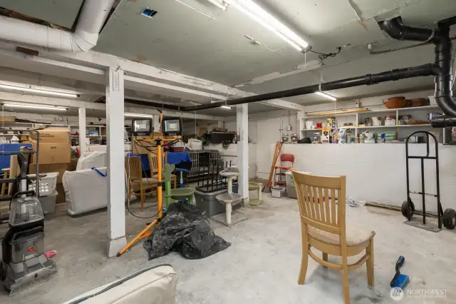 Basement is over 1300 square feet and has a tone of storage room. Ceiling has been sheetrocked out, and there is a second hookup for laundry in the basement.