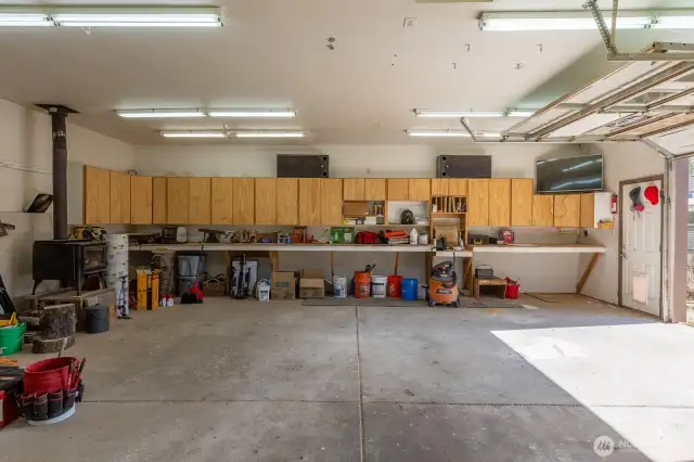 Back wall of shop with a ton of storage cabinets