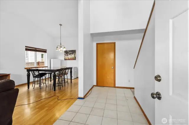 Bright open entryway with high ceilings.