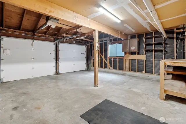 Spacious 2-car garage with work bench