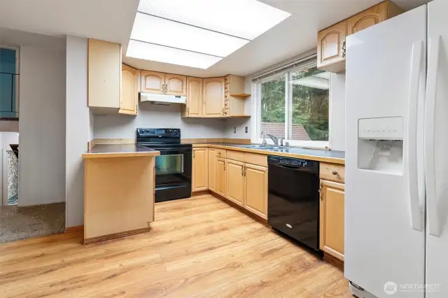 Cozy kitchen space with room built-in desk area