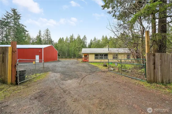 driving through the gate you will be very impressed by the freshly painted home and massive 36x72 ft shop.