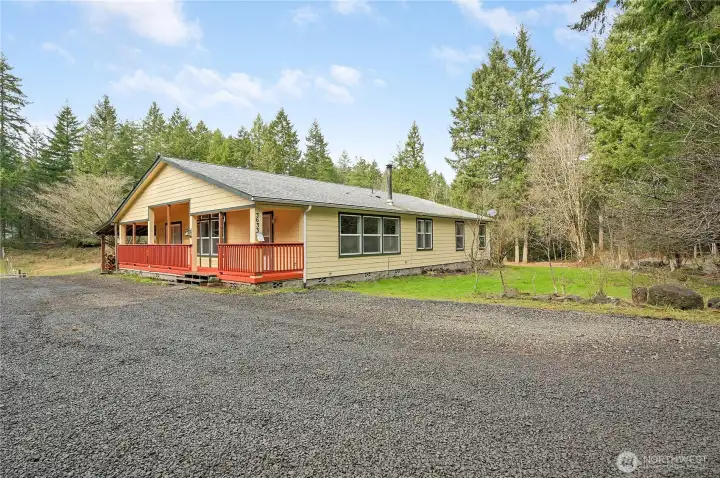 The covered porch gives shelter when entering the home on those stormy days.