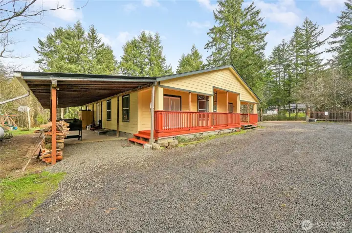 The large covered porch has a brand-new metal roof, and hot tub and sauna, it has it all!!