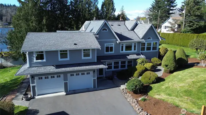 The spacious 5-bed 3-bath home is designed to capture stunning year-round lake views.