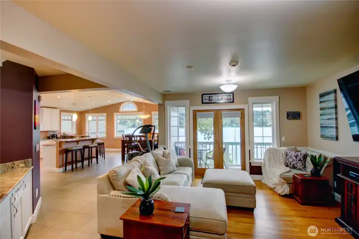 The living room welcomes you to the lake with open concept living, perfect for enjoying the lake views with family and friends.