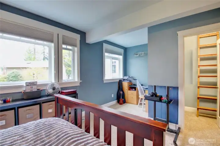 2nd Bedroom on main level has a great office nook and walk in closet with a unique hidden loft - to make for a cozy nook for the kids or extra storage