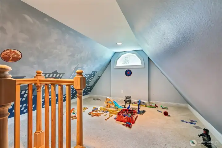 Cozy loft in second bedroom. Great play area or storage.