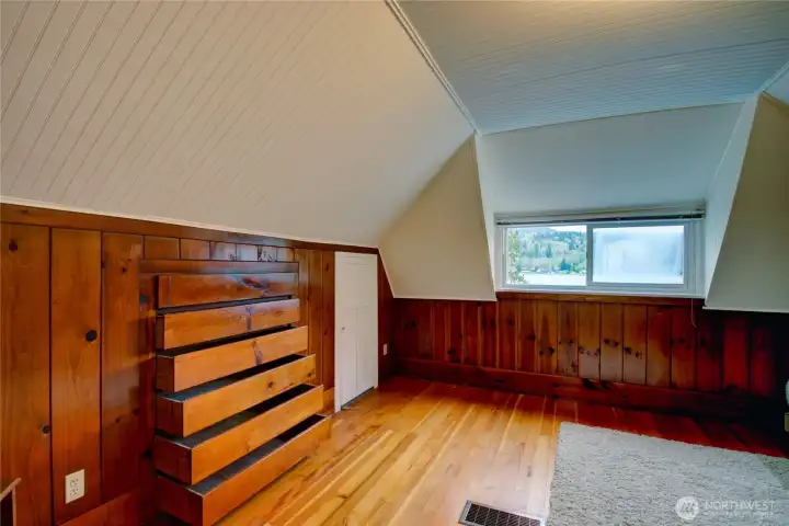 This is the upper floor bedroom #3. With the timeless lake cabin vibe. Perfect space to create a bunk room for the kids. You will love the detail of the built in drawers and extra storage space.