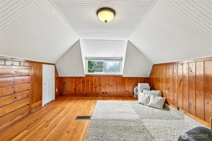 This is the upper floor bedroom #3. With the timeless lake cabin vibe. Perfect space to create a bunk room for the kids. You will love the detail of the built in drawers and extra storage space.