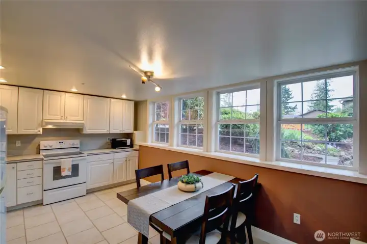 Lower level (2nd) kitchen filled with natural light and spacious kitchen set-up.