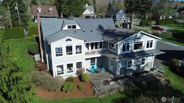 This historic 5bed/3bath home is filled with natural light and showcases stunning year-round views. Designed for both comfort and entertaining, the residence features two separate living quarters—ideal for multi-generational living or guest accommodations. The main-level primary suite offers a private retreat with fireplace, spa-inspired bath, and adjoining flex space.