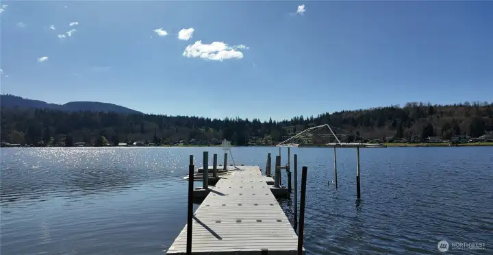 Enjoy a private EZ Dock with boat lift, 2 jet ski ramps, and slide for endless lake adventures.