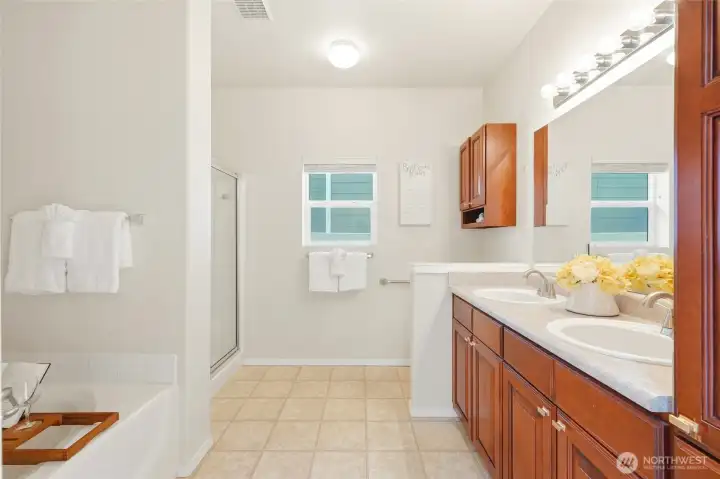 Ensuite bath features a soaking tub for ultimate relaxation.