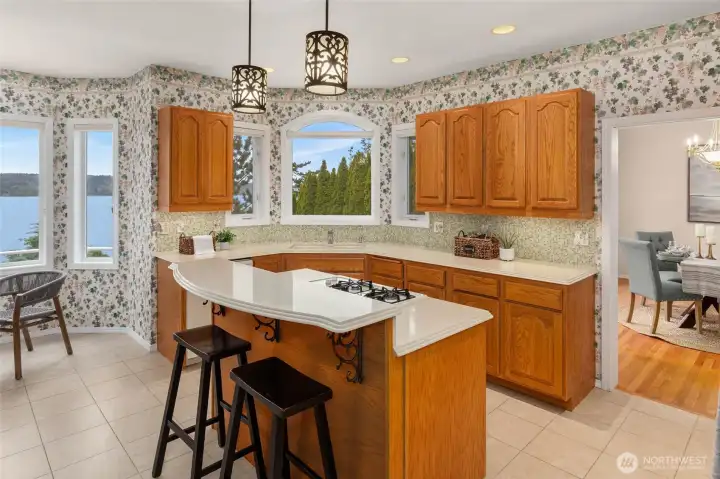 Well-Appointed Kitchen — Slab Counters and Custom Backsplash