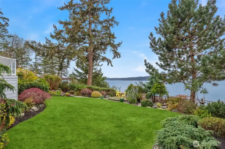 Fully Fenced Backyard and Bluff — Lush Grounds with Garden Space