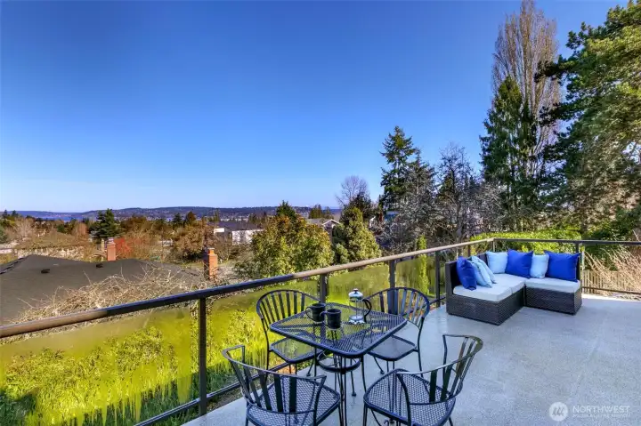 View deck off family room offers views of mountains and Lake Washington.