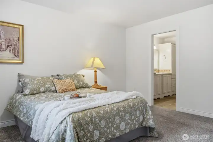 primary bedroom with ensuite bathroom
