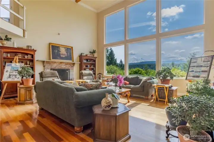 Expansive oversized windows in the living area showcase breathtaking views of Mt. Rainier and the surrounding territory.