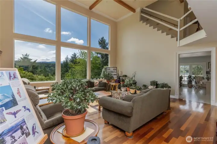 The living area showcases impressive Brazilian cherry hardwood floors.