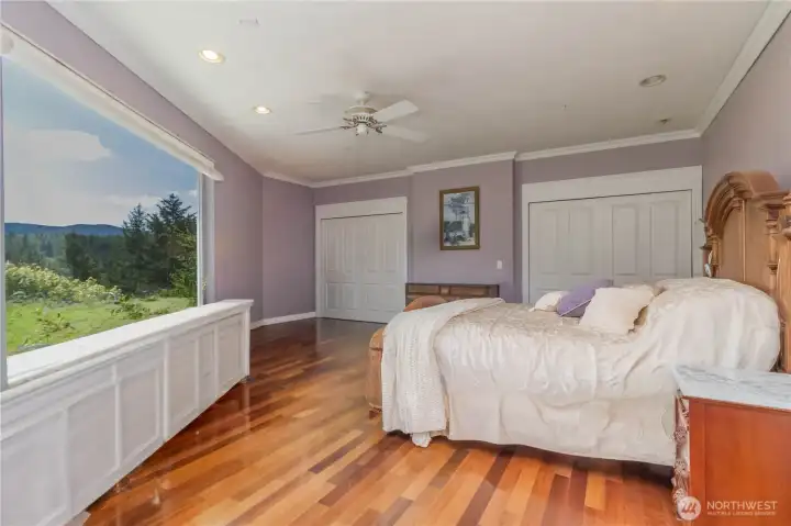 Imagine waking up in your main-floor primary suite to this view—it’s the perfect way to start the day!