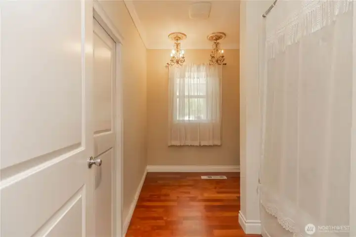Entry to the Jack & Jill unfinished bathroom off the main-floor den/office.