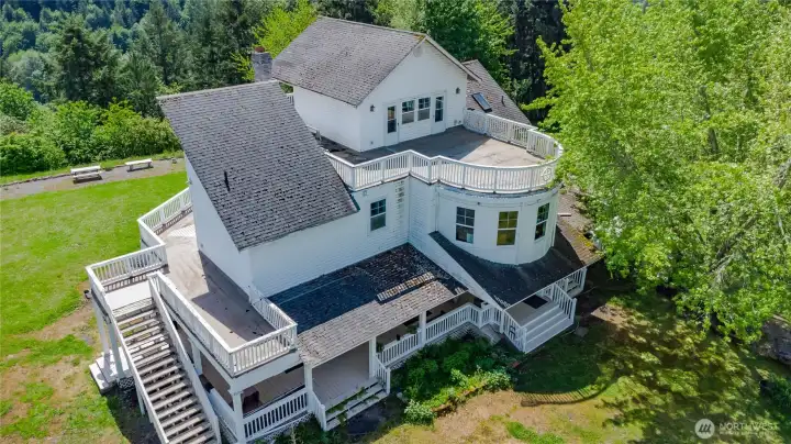 Great aerial view of the front of the home, showcasing its impressive size and scale.