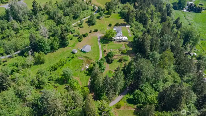 Great overall view of the property and outbuildings.