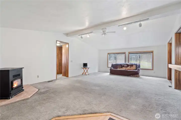 LIVING ROOM: Alternate View of the Living Room facing the front windows. Doorway leads to 2 Bedrooms and Full Hall Bath.