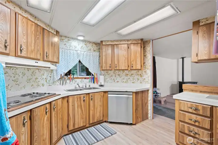 KITCHEN w/Newer Laminate Floors, Stainless Steel Double Basin Sink, SS Dishwasher