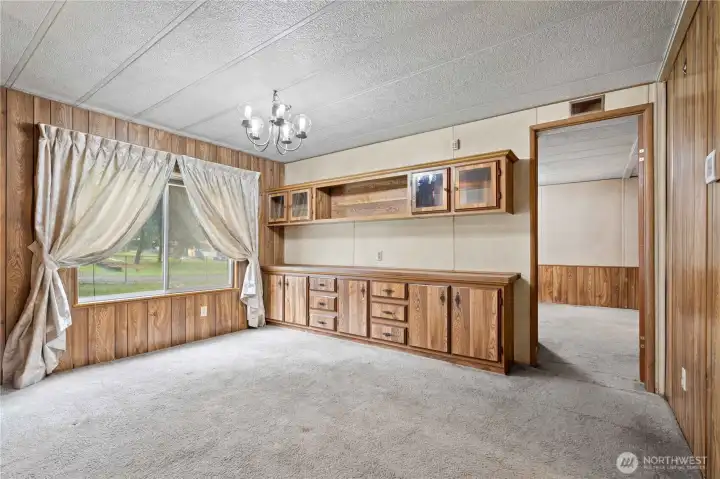 DINING ROOM w/Built-Ins! Doorway leads to Primary Bedroom.