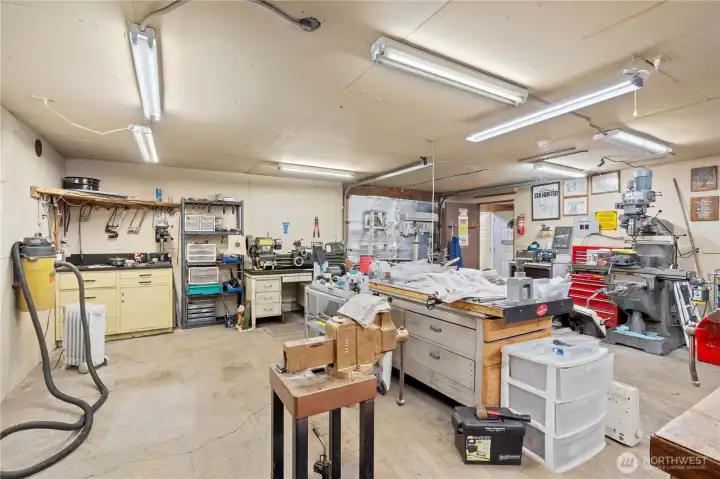 2-CAR SHOP: this is a 24x24 2-Car Sized Shop w/10x24 Office attached. Interior has Lighting, Subpanel and Electrical Outlets. No Water. Garage Door doesn't currently open.