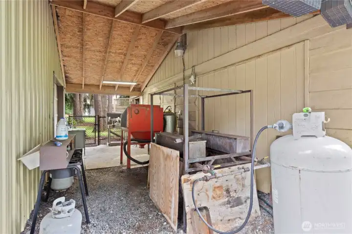 BREEZEWAY: Alternative View of Breezeway. Note: 2-Car Shop is framed interiorly to have 2-Garage Doors. Seller installed only one and no longer opens it. Could easily be adjusted.