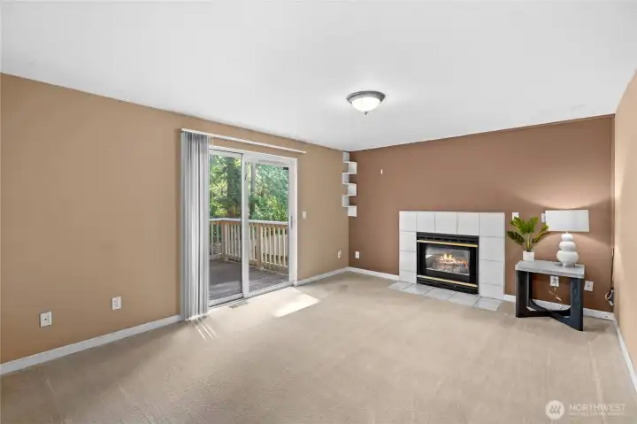 Maximize your living space with a view! Sliding doors flood this adaptable flex room with natural light and lead straight out to the backyard deck, effortlessly connecting your indoor bonus space to outdoor relaxation.