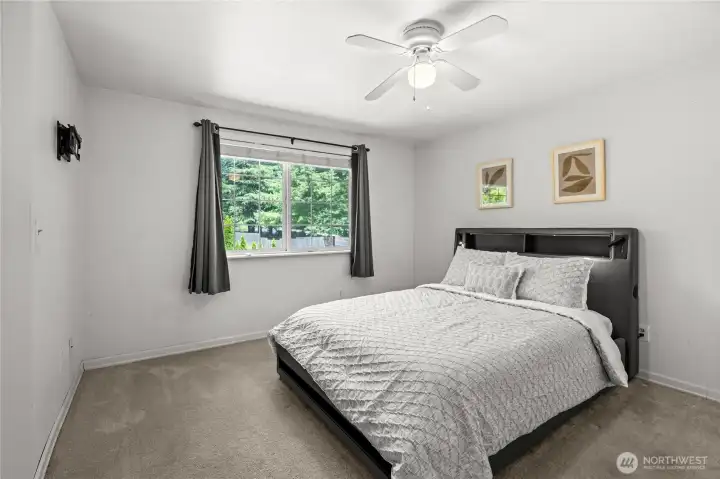 Your private sanctuary just up the stairs. The spacious primary bedroom offers a peaceful escape from the day, wrapped in comfort and designed to be the ultimate relaxing retreat at the end of the evening.
