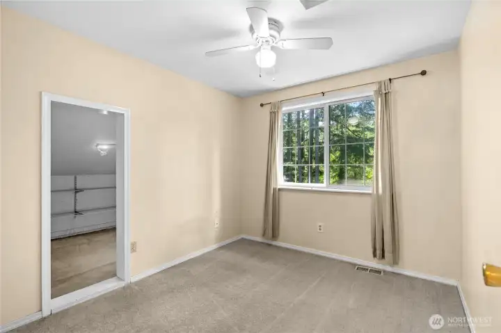 A cozy haven for guests or family! This bright and inviting extra bedroom offers plenty of space, wonderful natural light, and a peaceful atmosphere that makes anyone feel right at home.