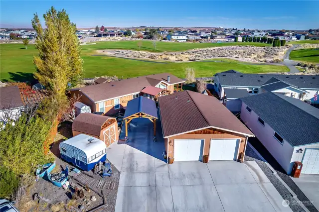 Aerial view of the home, on the golf course!